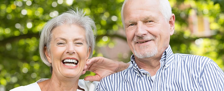 smiling retired couple