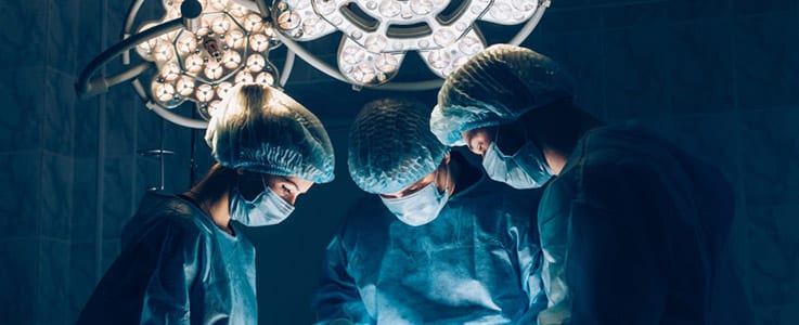 surgeons conducting surgery