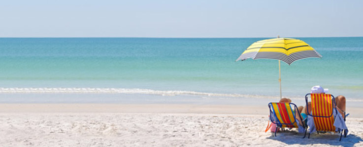 couple lounging on beach