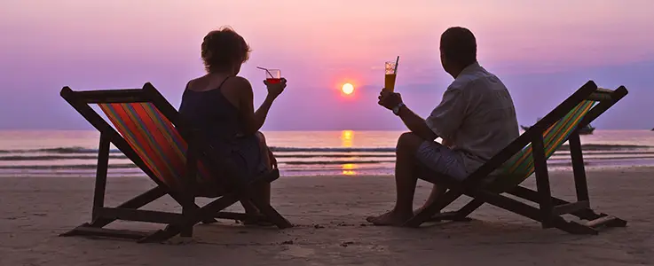 retired couple on beach