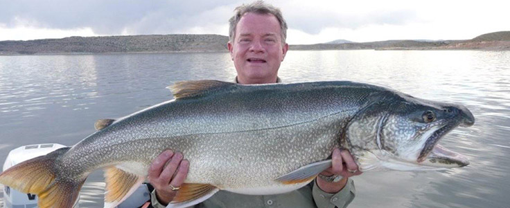 lyle holding a big fish in his hands